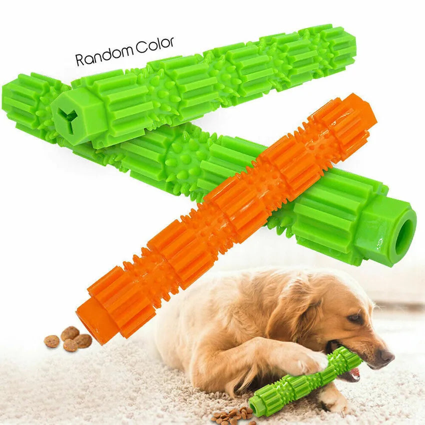 Green and orange rubber dog chew toy with treat dispensing opening and textured cleaning surfaces