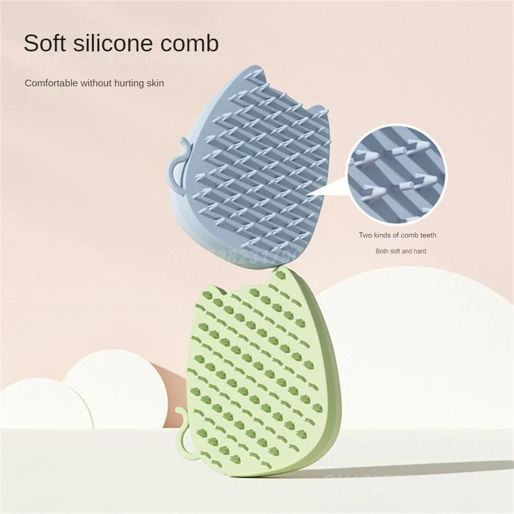 Blue sponge silicone pet comb brush with dual soft and hard bristles for cat and dog grooming.