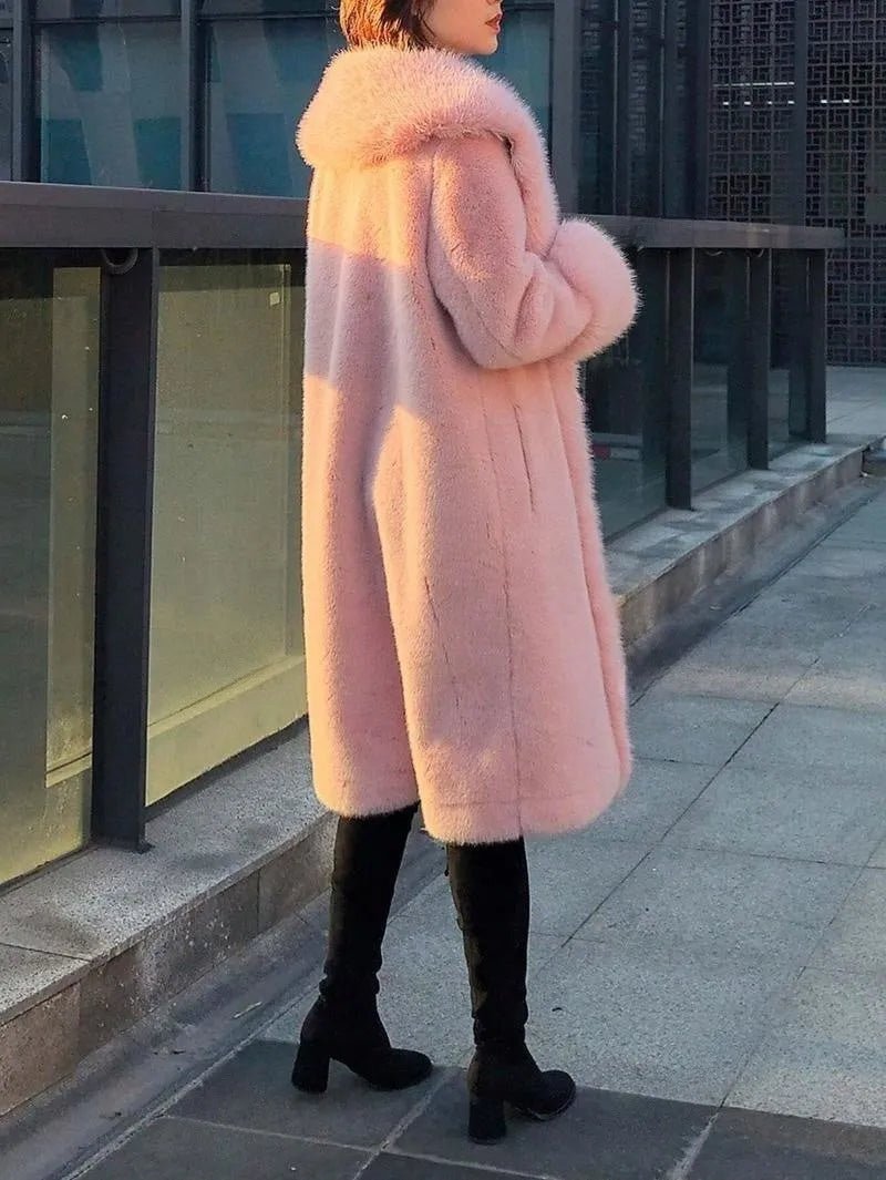 Women's grey thick faux rabbit fur mid-length coat with a large artificial fur collar.