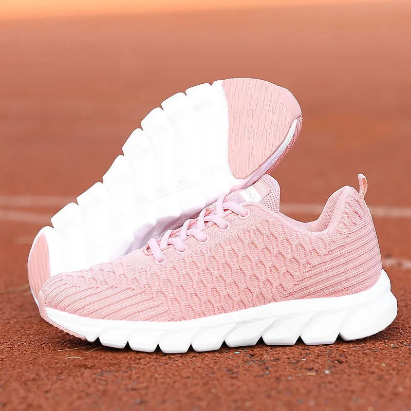 Women's running shoes with fly weaving upper in black, pink, or white colour options