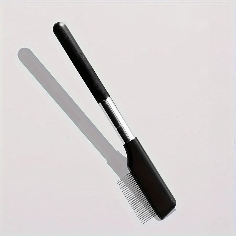 Black ambidextrous pet grooming brush with soft bristles and a separate comb attachment for dogs and cats.