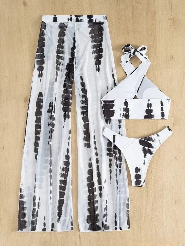Three-piece women's swimsuit set with bikini top, bottoms, and matching mesh trousers