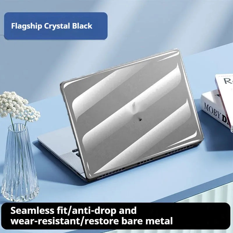 Clear plastic hard protective shell case for a MacBook Pro laptop on a table