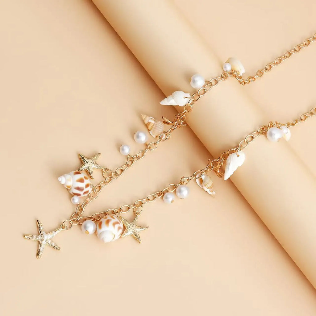Alloy metal waist chain and matching bracelet set with star detailing for women's summer beachwear