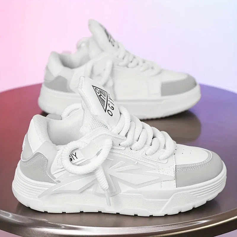 Men's white chunky low-top sneakers with round toe and lace-up front on rubber sole
