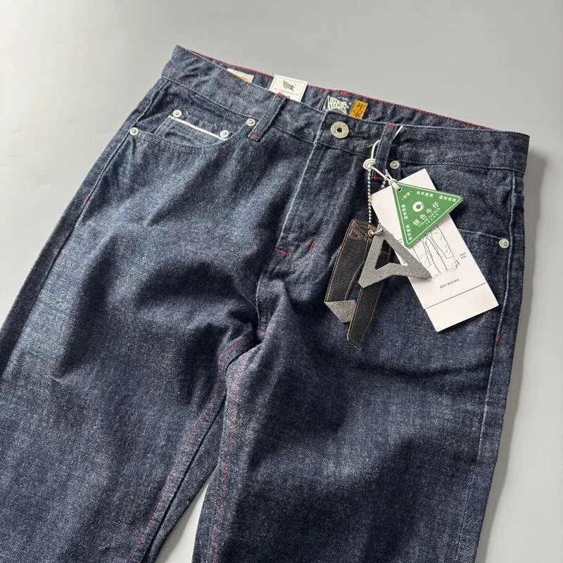 Men's primary colour straight leg denim trousers on a mid-waist fit model.