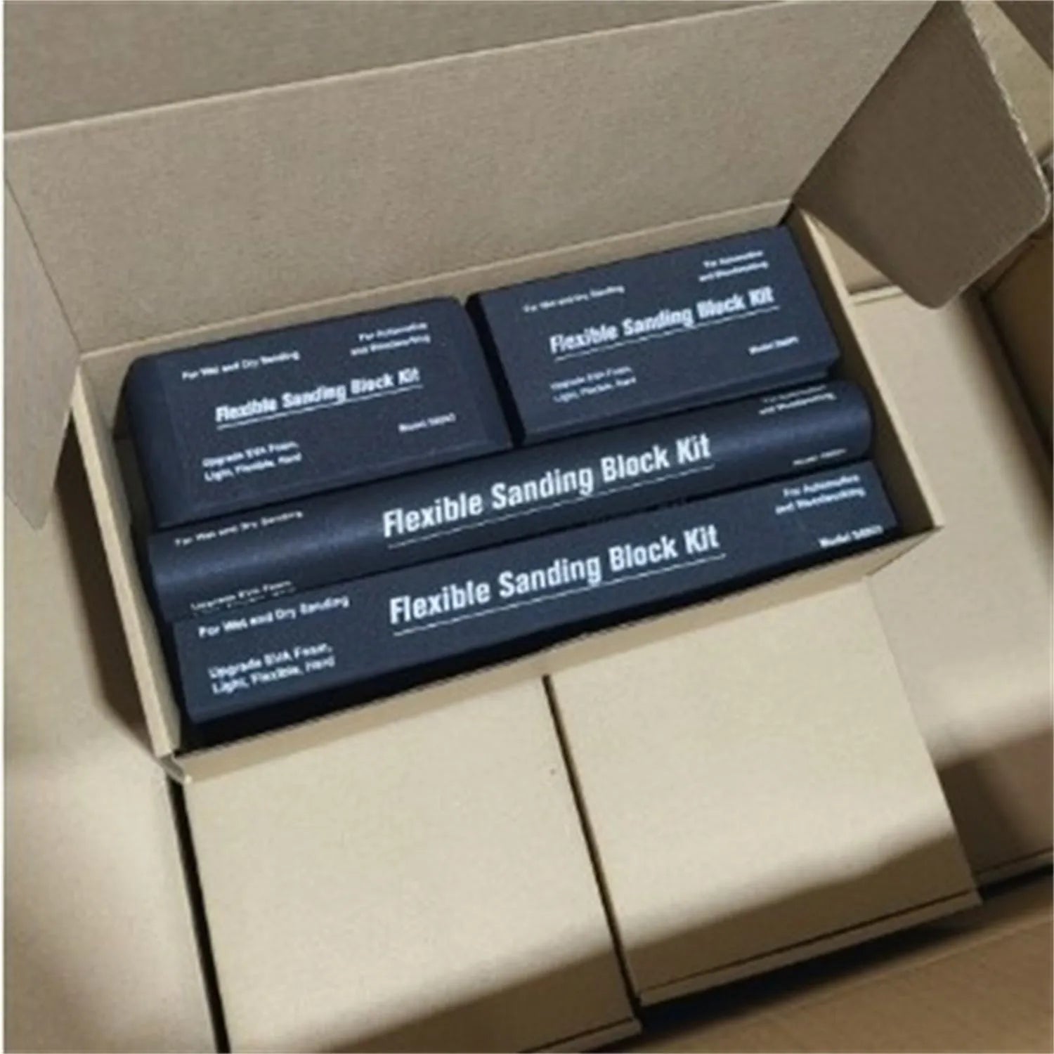 Seven frosted black EVA building blocks with metal construction for architectural modelling
