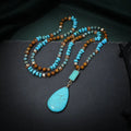 Turquoise blue water drop imitation mineral pendant necklace with ball bead chain, heart and geometric shapes.