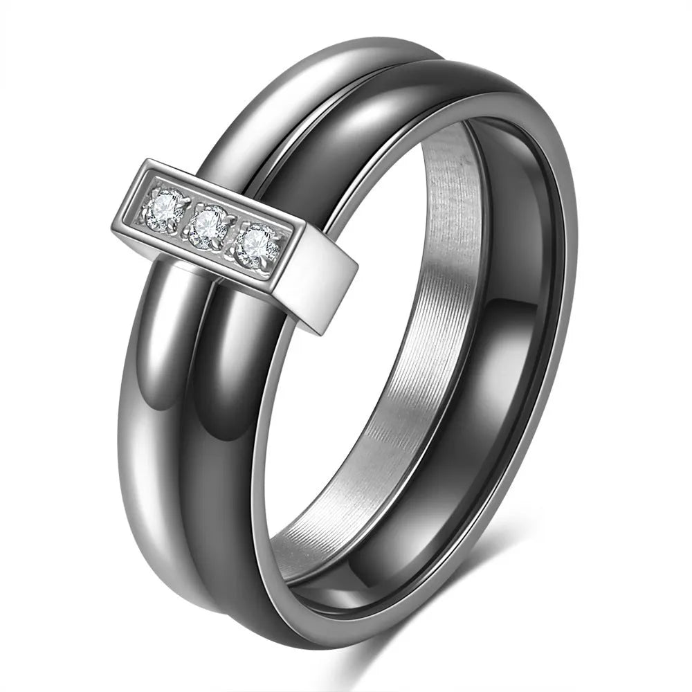 Ceramic ring with glossy stitching and zirconium detail in steel black or gold white finish
