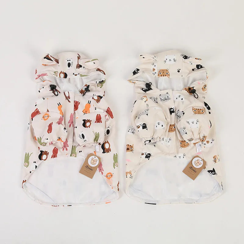 Beige cartoon dog raincoat with double waterproof PU coating, shown in small animal and cat head designs.