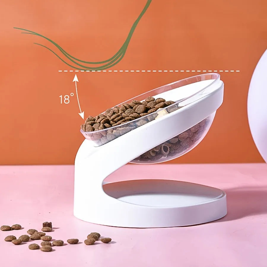 White elevated tilted plastic cat food bowl for ergonomic feeding.