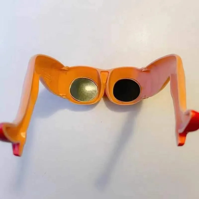Orange oversized novelty plastic sunglasses for parties and travel.