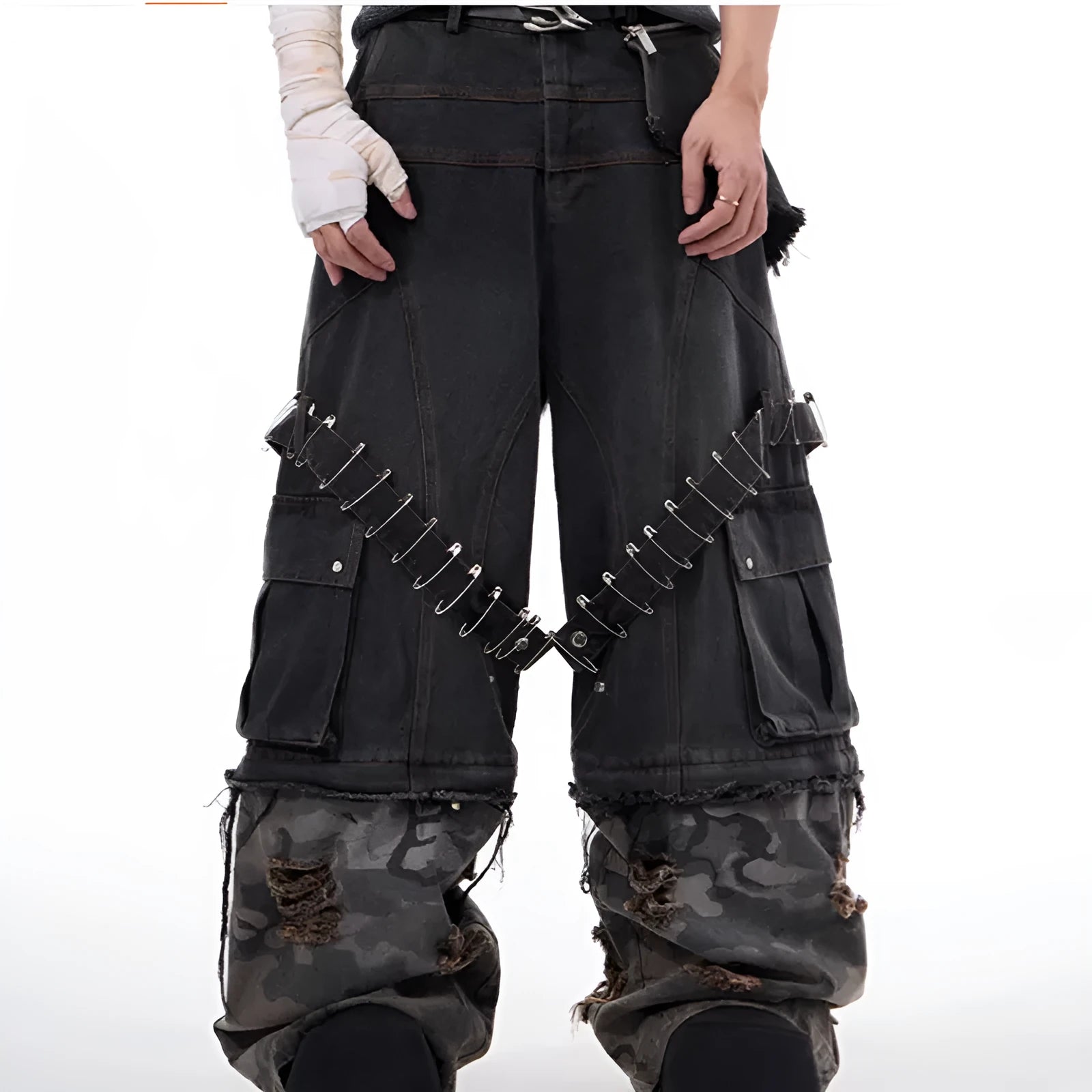 Men's grey camouflage jeans showing pin and ribbon splicing detail on the leg.