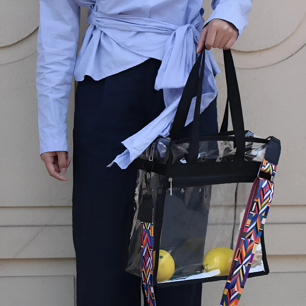 Transparent clear PVC women's messenger bag with double shoulder straps, shown in a brown front bag colour variant.