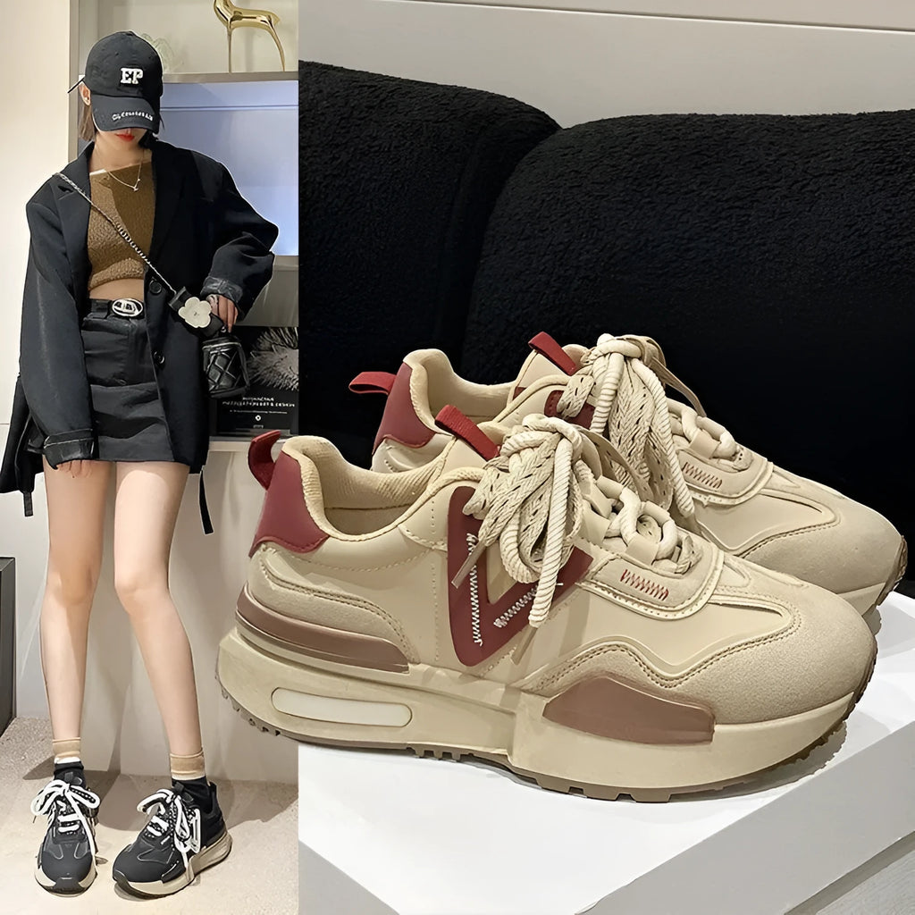Women's black retro platform sports shoes with chunky rubber soles and lace-up closure