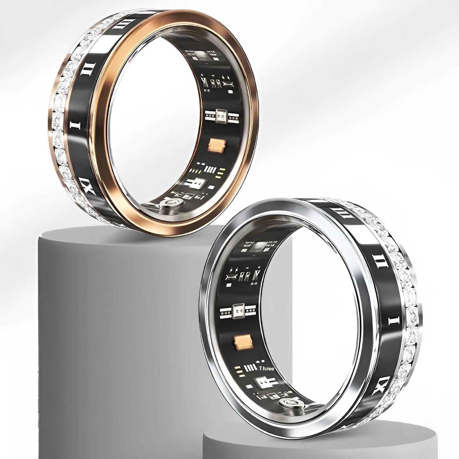 Silver and gold smart ring with diamond inlay on a finger, showing its health monitoring design.