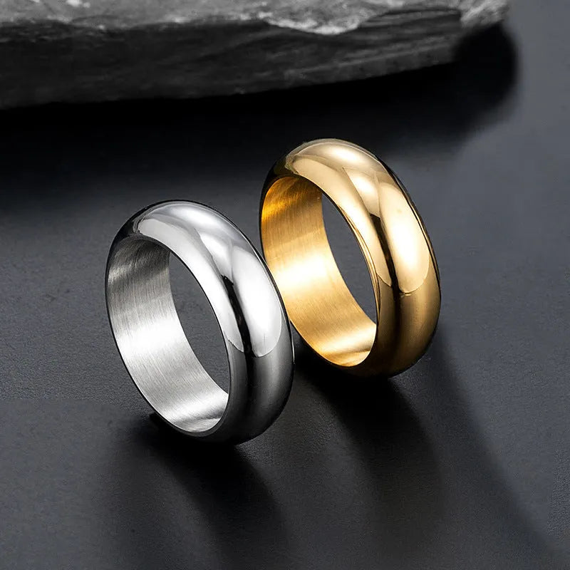 Glossy electroplated titanium steel ring shown in gold, black, and steel colours on size display