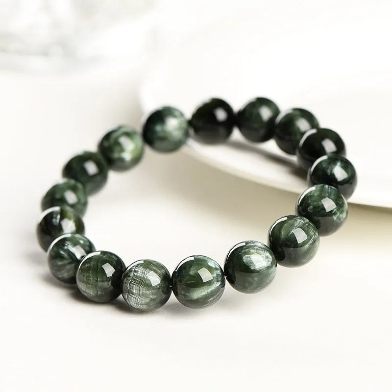 Natural green dragon crystal bracelet with 8-9mm round beads and geometric ruyi design.