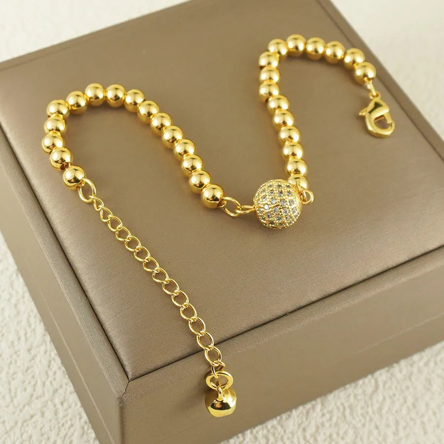 Women's copper bracelet with heart shape design, single ball zircon, and Arabic style elements