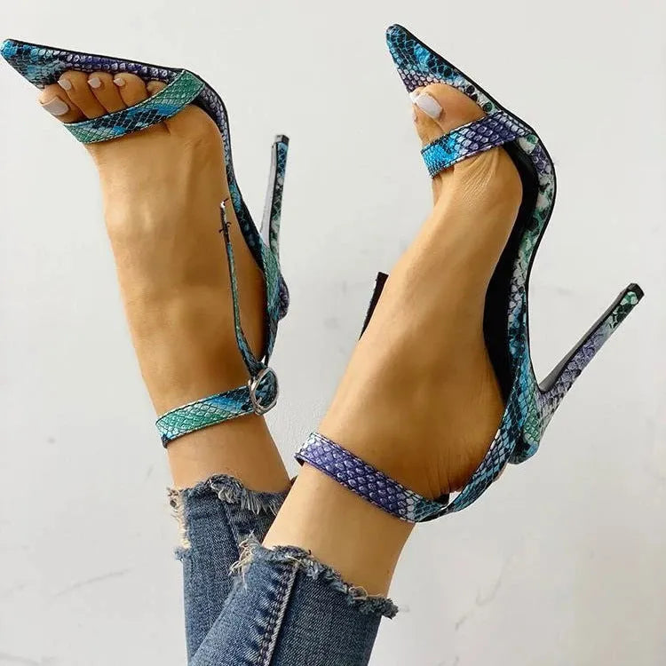 Serpentine blue women's high heels with hollow-out detailing and a buckle fastening on the ankle strap
