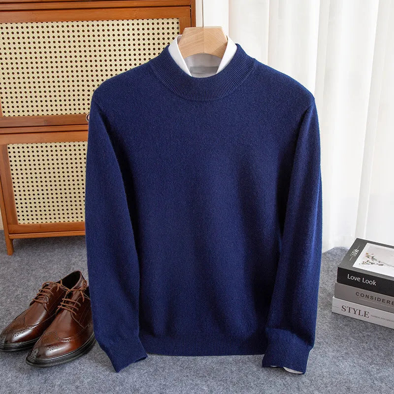 Men's half-turtleneck loose fit wool sweater in a neutral colour on a hanger.