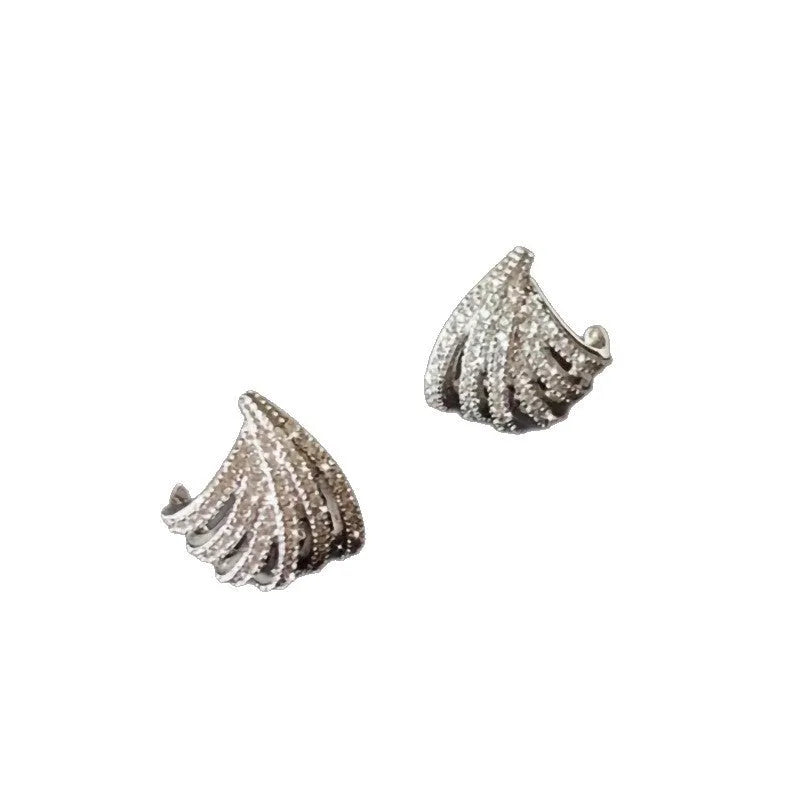 Geometric zircon earrings with platinum electroplated finish and line design details