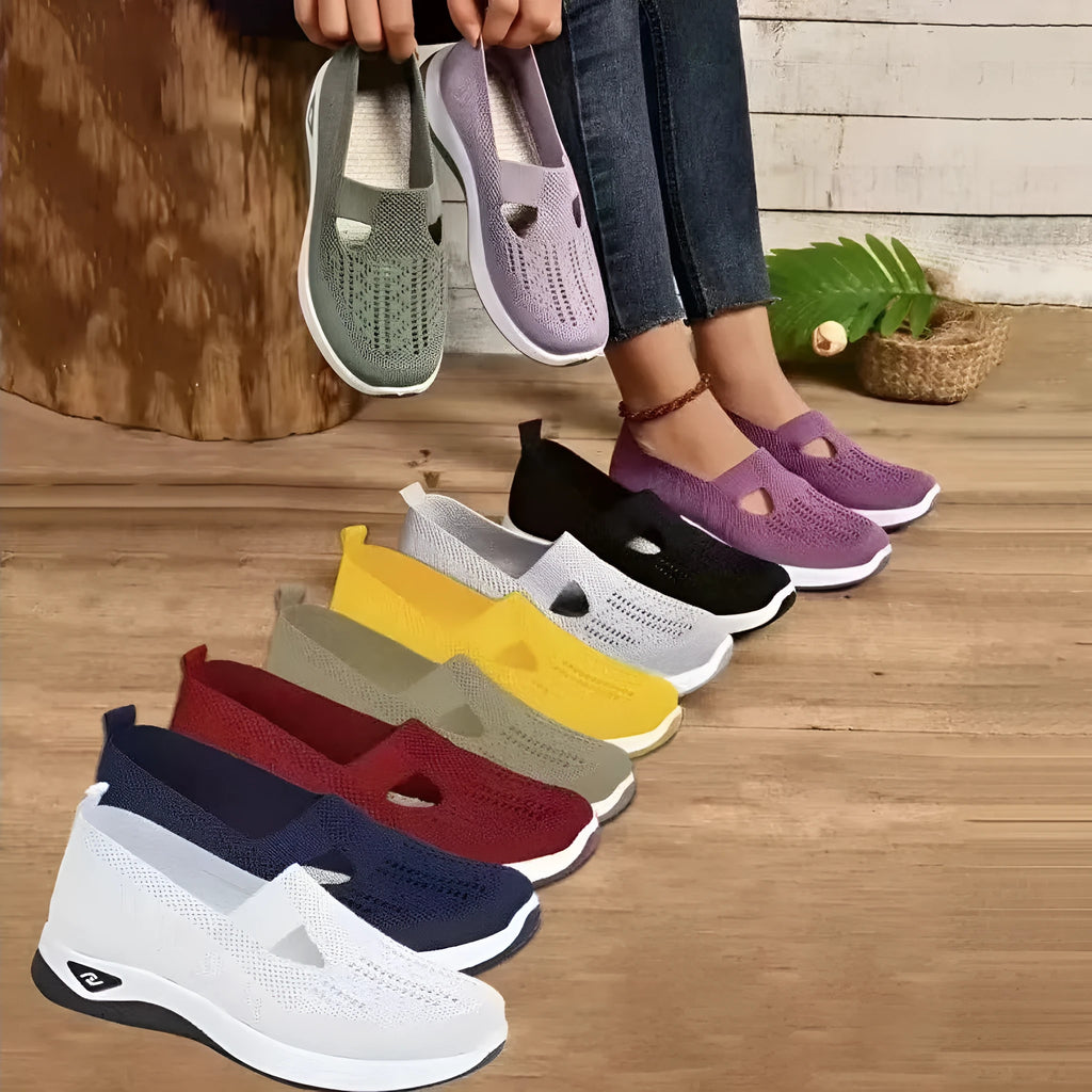 Women's low-top mesh casual shoes with a T-strap, flat heel, and round toe in various colours.