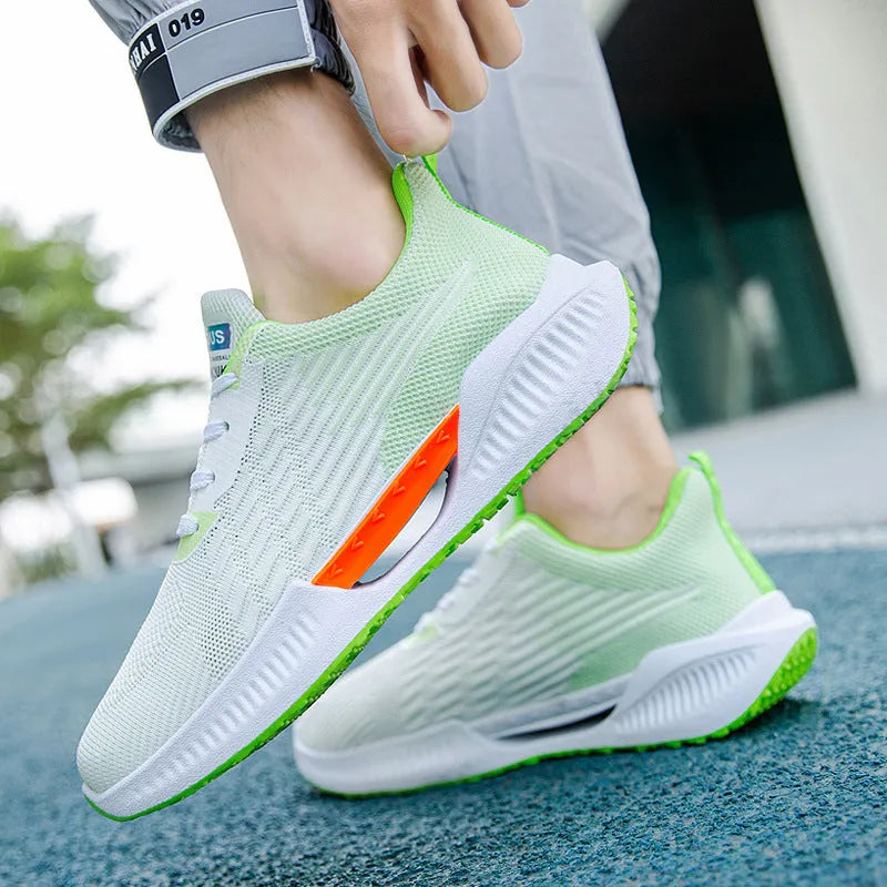 A pair of blue men's casual mesh sports shoes with a round toe and cloth upper.