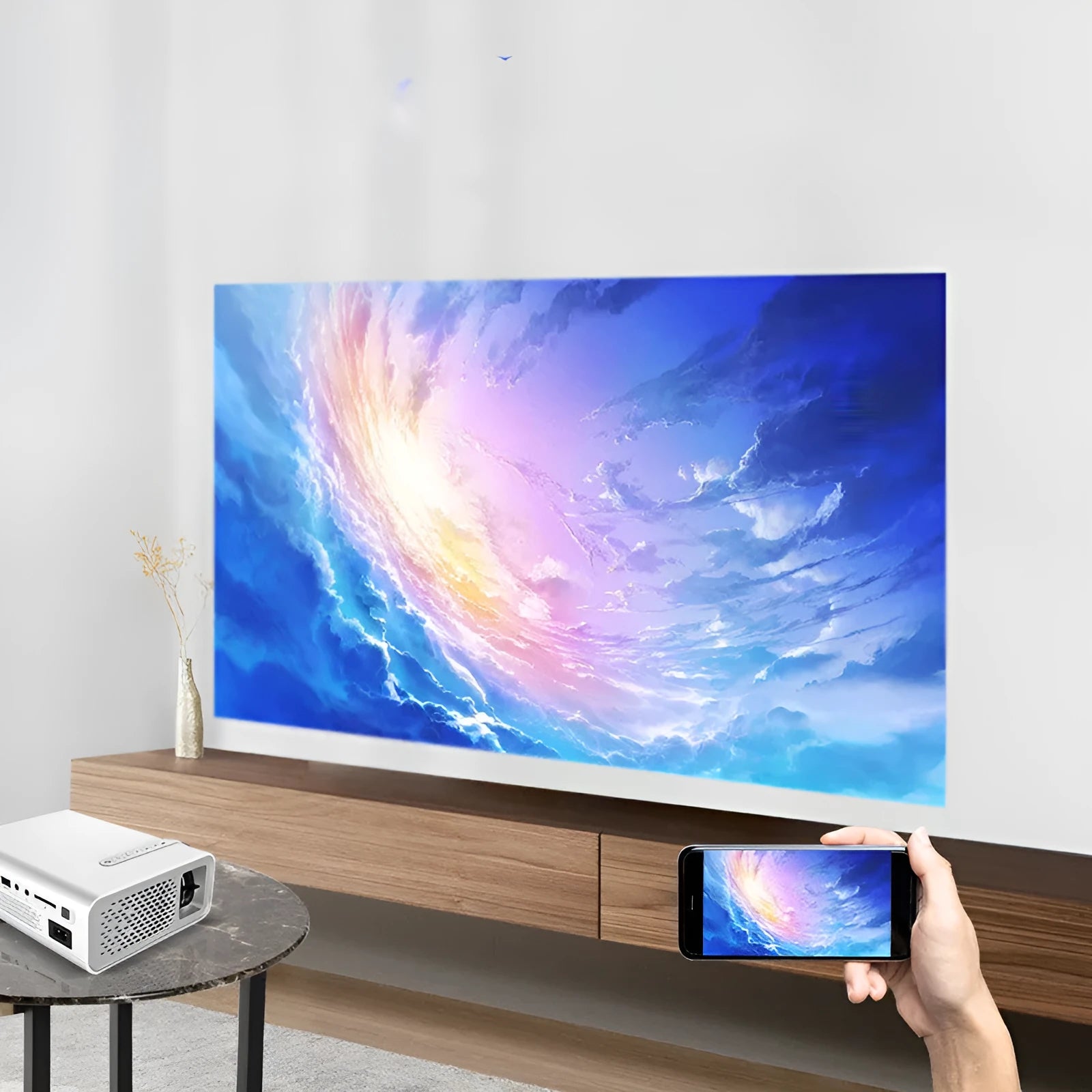 YG530 mini mobile phone projector in black or white with wireless connectivity for same-screen projection