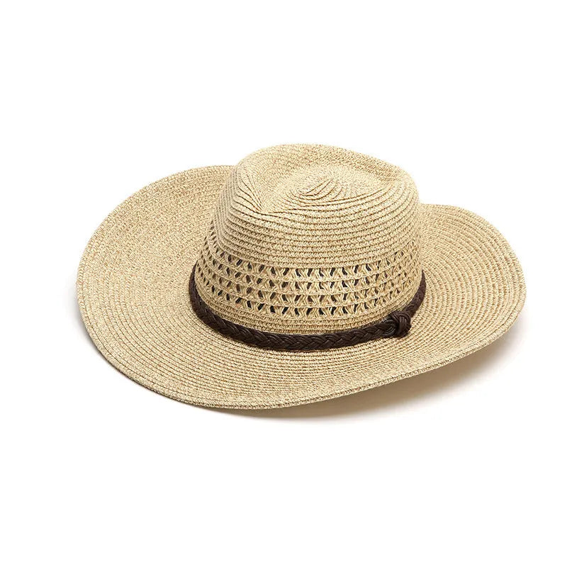 Men's foldable straw sun hat with big brim in beige colour on outdoor background