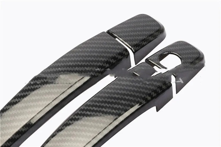 Carbon fibre pattern door handle cover for Opel Vauxhall Astra H and J models.