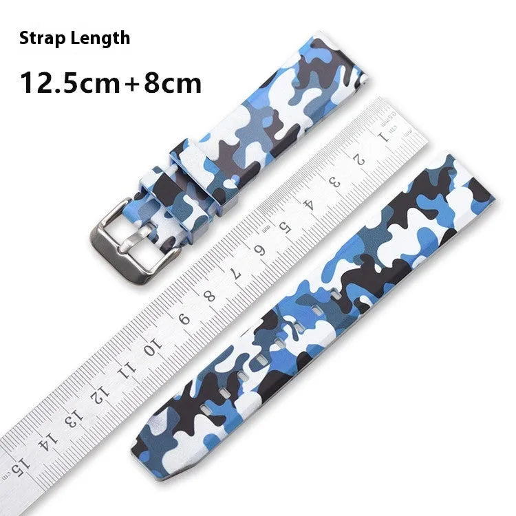 Silicone camouflage pattern watch strap in blue, grey and green, showing flat head ends.