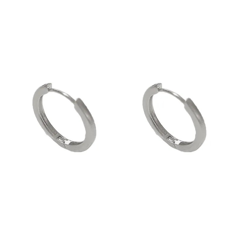 Women's simple geometric round ear clip with gold or silver plating on copper base