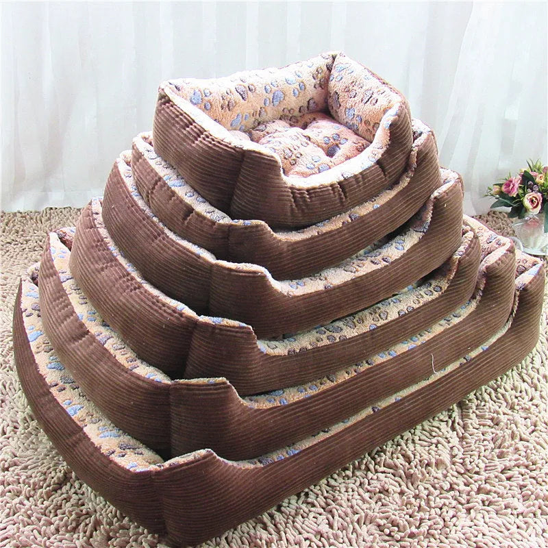 Beige plush pet dog bed with raised sides, shown next to a small dog.