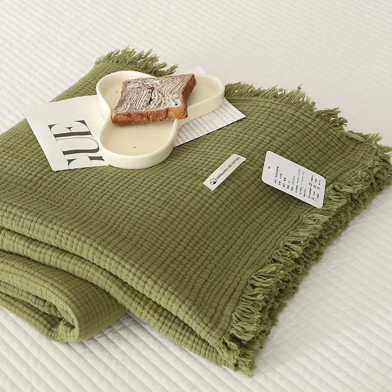 Four-layer gauze cotton blanket with tassel trim in various colours
