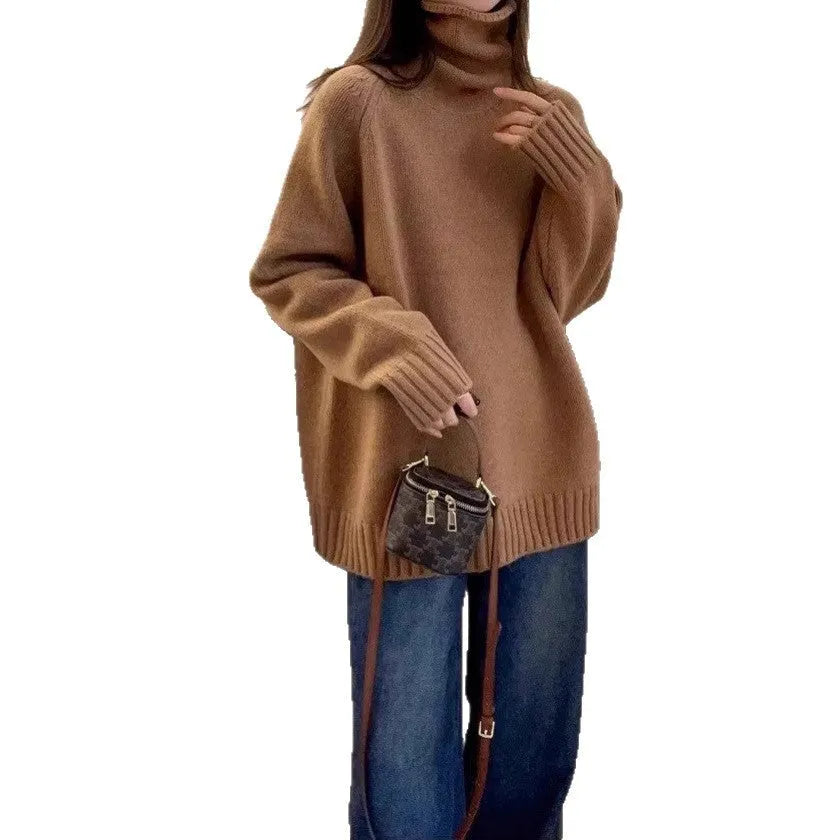 Women's loose black turtleneck sweater with a thick curling pile collar, casual style.