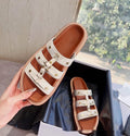 Women's retro Roman style sandal slippers in patent leather sheepskin, available in white, black and brown
