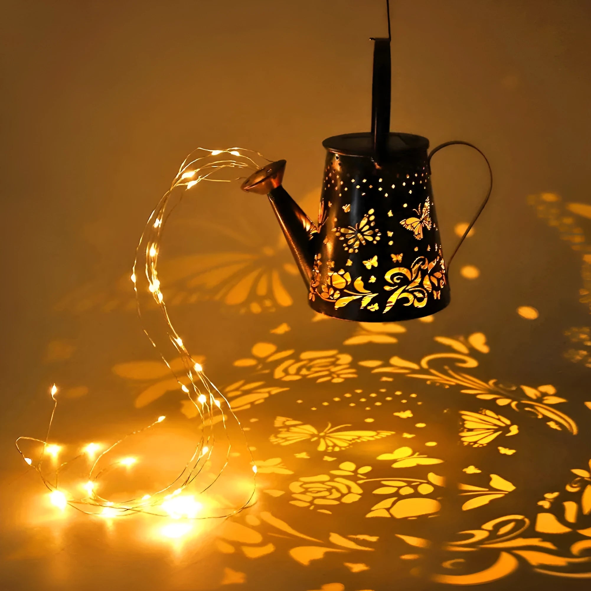 Solar garden lamp with tapered butterfly iron lantern design in warm white LED illumination