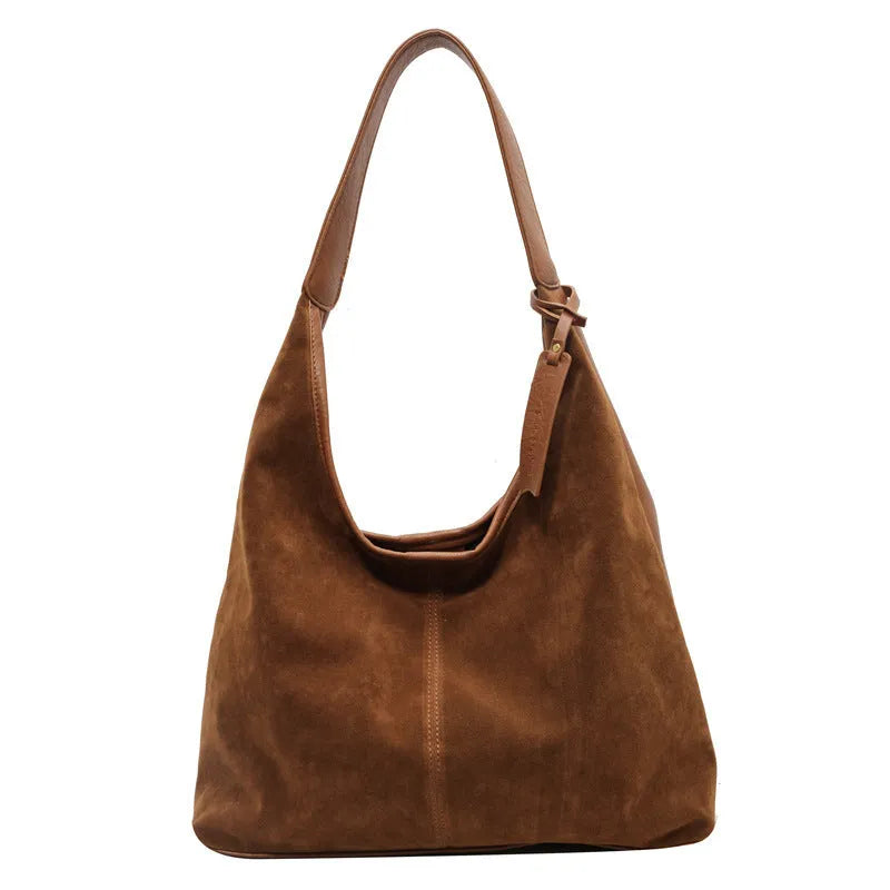 Retro PU shoulder bag with suede stitching and bucket shape in brown colour