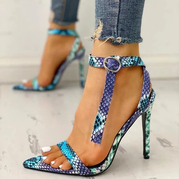Serpentine blue women's high heels with hollow-out detailing and a buckle fastening on the ankle strap
