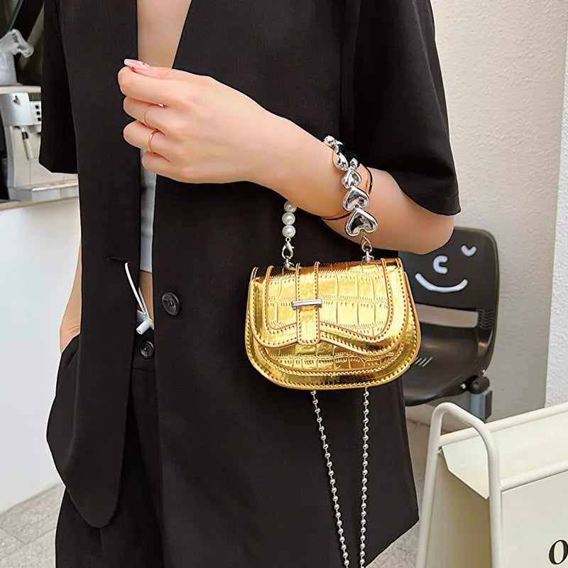 Women's silver mini tote saddle crossbody bag with mobile phone pocket and synthetic leather lining