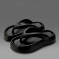 Solid colour EVA flip-flops with thick wedge sole and decorative bow detail