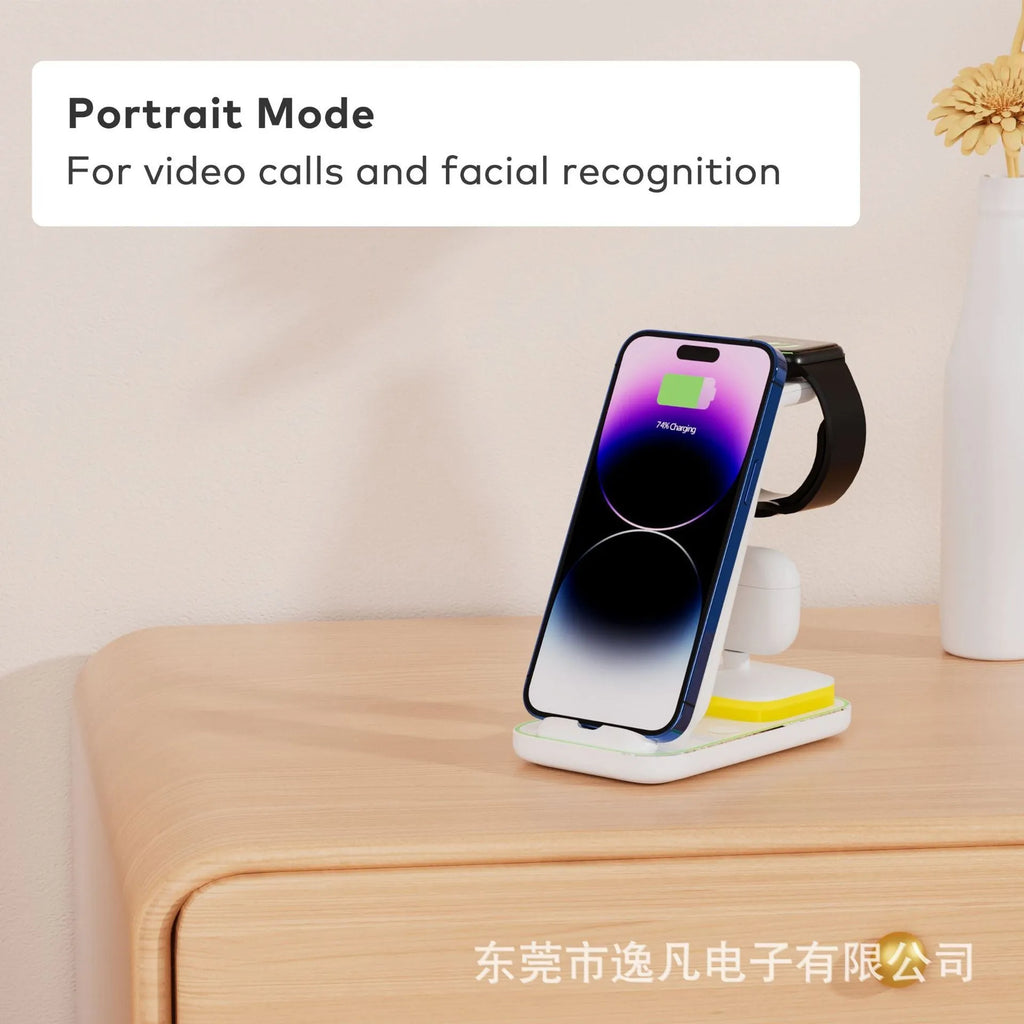 Black vertical wireless charger showing phone in stand with watch and earbuds charging areas