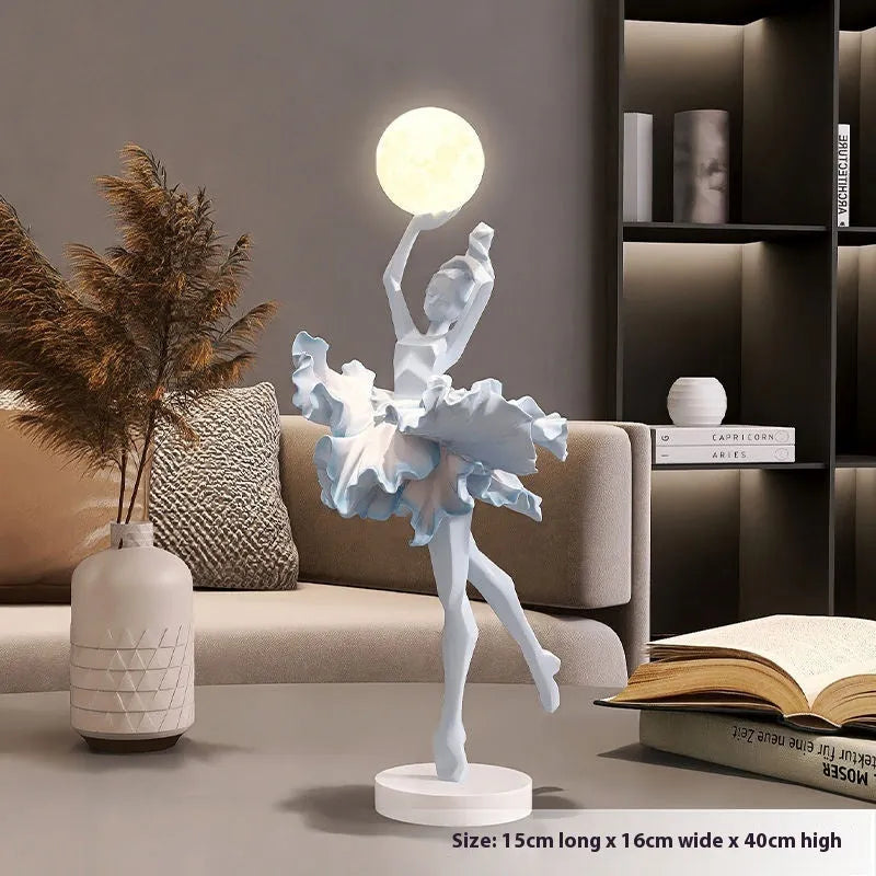 Art Girl Atmosphere small USB night lamp in Black Gold, White, Pink, and Light Blue colours on a surface.