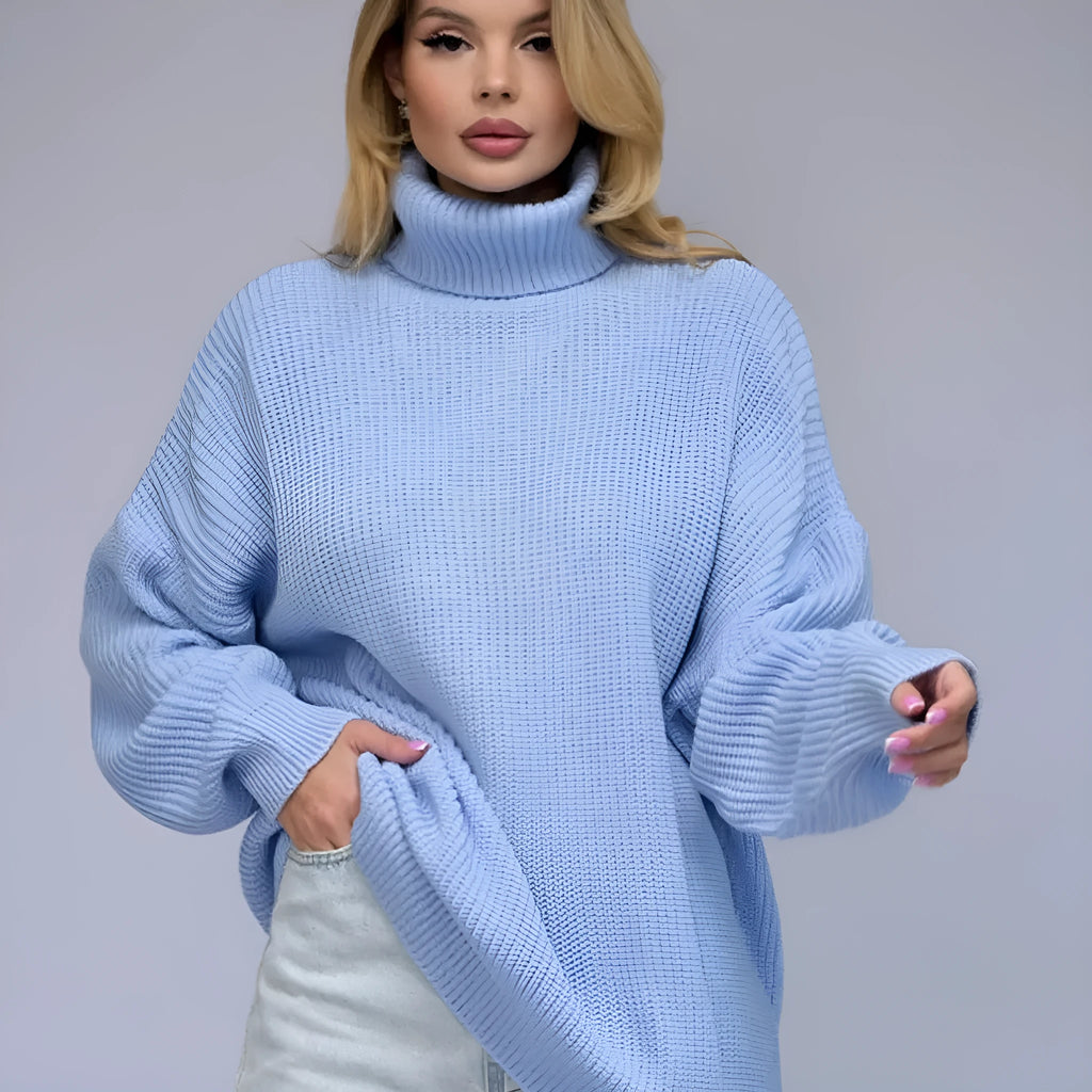 Women's high neck loose fit sweater in imitation cashmere polyester fabric.