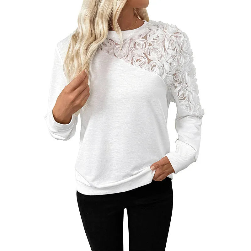 White floral pattern long sleeve women's top with loose pullover fit
