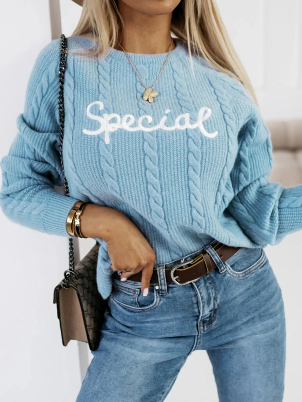 Blue leisure pullover with embroidered letter detailing and crew neck design