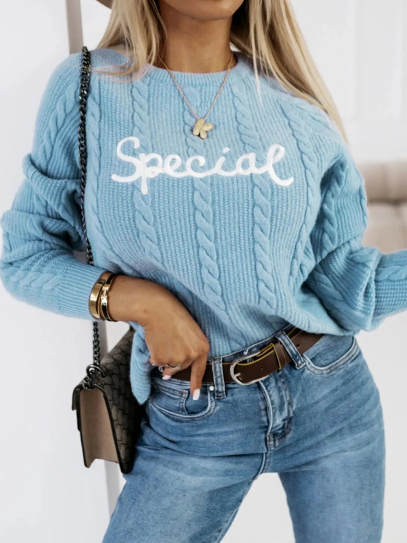 Blue leisure pullover with embroidered letter detailing and crew neck design