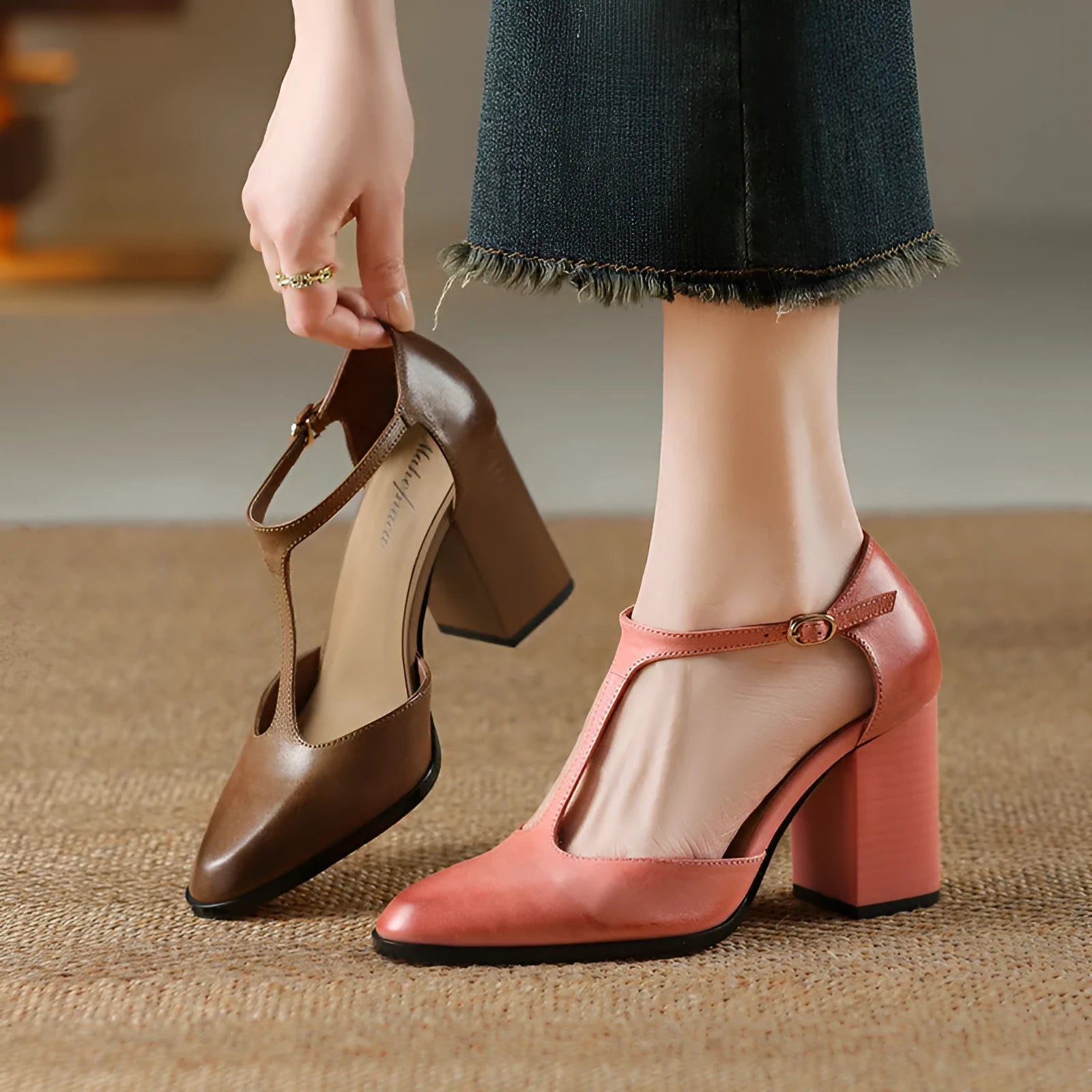 Baotou hollow women's retro pointed Mary Jane shoes in pink and dark brown with buckle fastening.