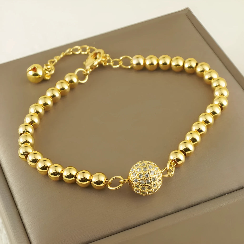 Women's copper bracelet with heart shape design, single ball zircon, and Arabic style elements